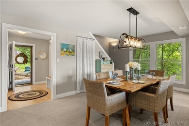 Discover peace and tranquility in this stunning lakefront home - photo 10