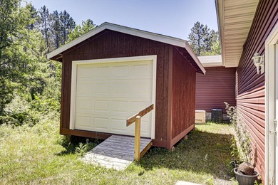 Nestled among the pines just minutes from Lower Post Lake in - photo 23