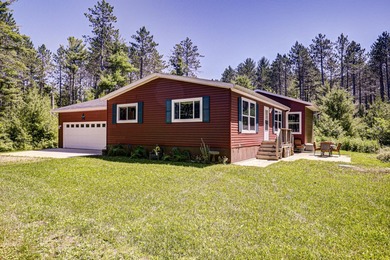 Nestled among the pines just minutes from Lower Post Lake in - photo 26