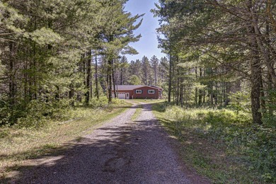 Nestled among the pines just minutes from Lower Post Lake in - photo 35