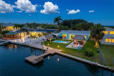 Experience the coastal lifestyle in this exquisitely upgraded - photo 1