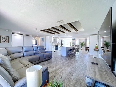 Experience the coastal lifestyle in this exquisitely upgraded - photo 6