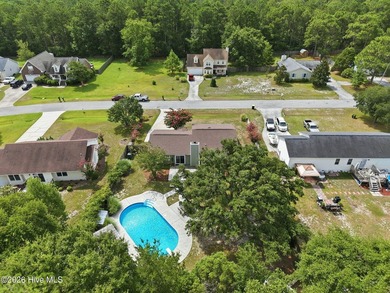Welcome home to this meticulously maintained 4-bedroom, 2-bath - photo 8