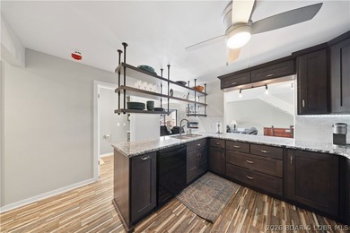 Top-floor lakefront condo offering some of the best views at The - photo 10