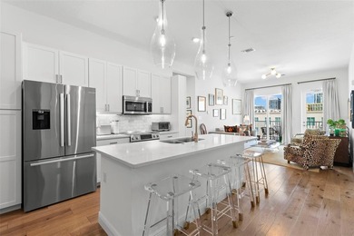 Perched atop the contemporary Domus Urbana Condominium, this - photo 4