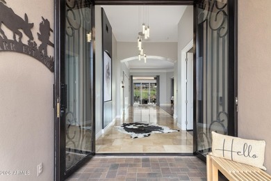 This exceptional home showcases a stunning open-concept design