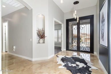 This exceptional home showcases a stunning open-concept design