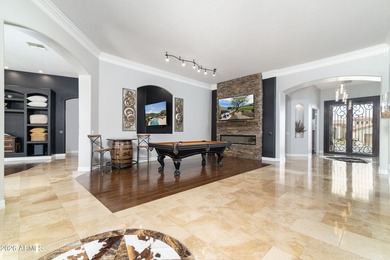 This exceptional home showcases a stunning open-concept design