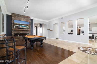 This exceptional home showcases a stunning open-concept design