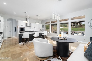 This exceptional home showcases a stunning open-concept design