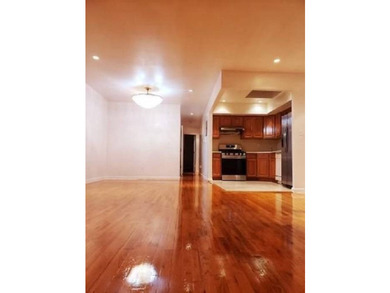 In the heart of Bensonhurst, a three-story solid brick building - photo 3