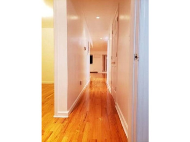 In the heart of Bensonhurst, a three-story solid brick building - photo 5