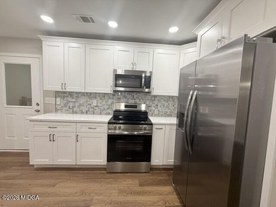 All Brick spacious home totally renovated. New kitchen with - photo 9
