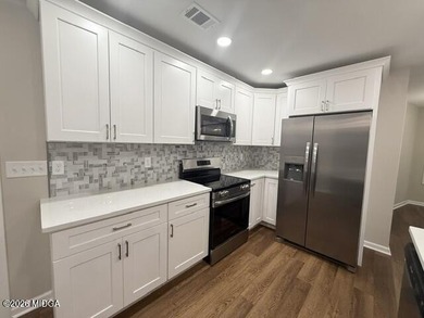All Brick spacious home totally renovated. New kitchen with - photo 10