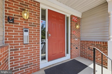 Welcome to this beautifully maintained, ADA accessible first - photo 2