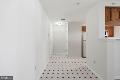 Welcome to this beautifully maintained, ADA accessible first - photo 4