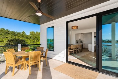Experience the pinnacle of waterfront living at this - photo 6