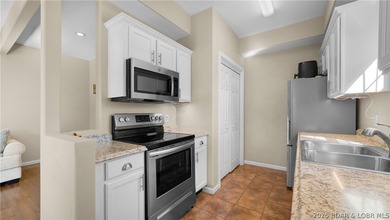 Hard-to-find end-unit townhome in the heart of Lake Ozark with - photo 5