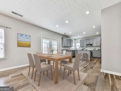 Lake & Golf Cart Living! This beautiful, spacious home offers 5