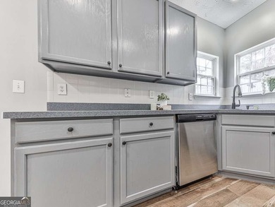 Lake & Golf Cart Living! This beautiful, spacious home offers 5