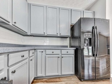 Lake & Golf Cart Living! This beautiful, spacious home offers 5