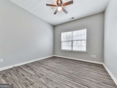 Lake & Golf Cart Living! This beautiful, spacious home offers 5