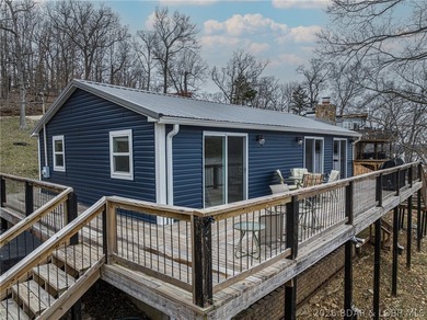 Welcome to the quiet side of Lake of the Ozarks. Set along 160' - photo 3