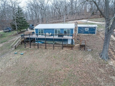 Welcome to the quiet side of Lake of the Ozarks. Set along 160' - photo 4