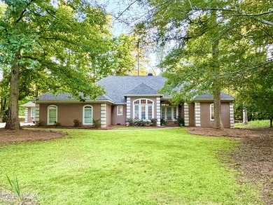 Gorgeous custom built 1 level hard coat stucco home located on - photo 1