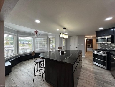 Luxury Riverfront living at The Cove at Canterbury. Discover - photo 5
