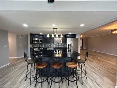 Luxury Riverfront living at The Cove at Canterbury. Discover - photo 7