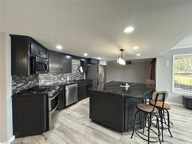 Luxury Riverfront living at The Cove at Canterbury. Discover - photo 8