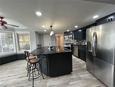 Luxury Riverfront living at The Cove at Canterbury. Discover - photo 9