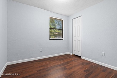 Move-in ready concrete block single-family home! Freshly - photo 13