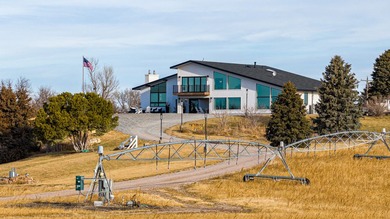Set on 31 pristine acres, this luxury estate features a - photo 2