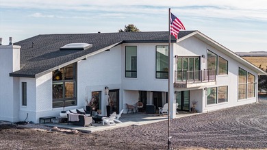 Set on 31 pristine acres, this luxury estate features a - photo 5