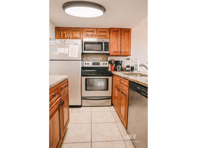 Welcome to this beautifully updated GROUND floor beachfront - photo 16