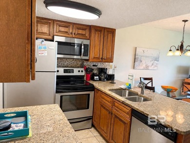 Welcome to this beautifully updated GROUND floor beachfront - photo 17