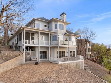 Experience elevated lakefront living in the exclusive community - photo 3