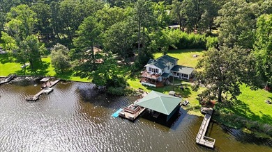 Wonderful rustic waterfront home on lake Lydia nestled along the - photo 27
