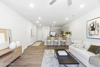 ''Welcome to this beautifully upgraded Watercrest end-unit - photo 3