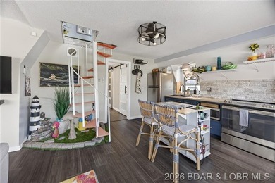Freshly remodeled, this charming A-frame instantly feels like a - photo 6