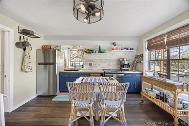 Freshly remodeled, this charming A-frame instantly feels like a - photo 7