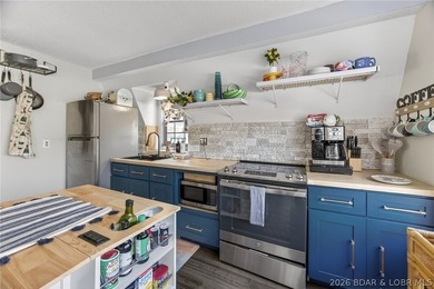 Freshly remodeled, this charming A-frame instantly feels like a - photo 9