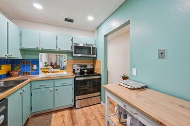 Welcome home to this charming 1-bedroom,1.5-bath VILLA located - photo 13