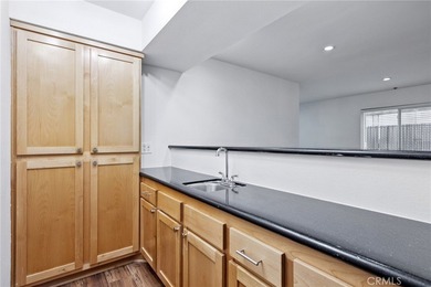 Spacious all one level WESTWOOD condo on first floor of a secure