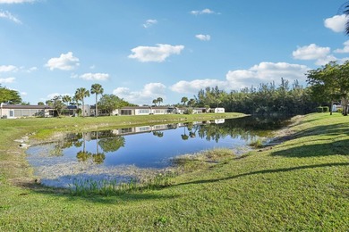 Welcome home to this charming 1-bedroom,1.5-bath VILLA located - photo 28