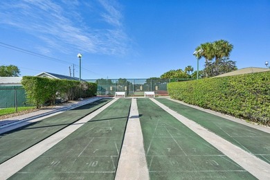 Welcome home to this charming 1-bedroom,1.5-bath VILLA located - photo 33