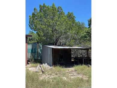 Peaceful country living with two homes on this 8.5 acres. Main