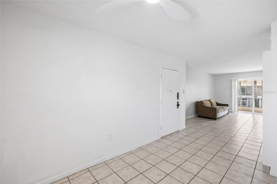 Virtually Staged. Two-bedroom condominium on the top floor with - photo 12